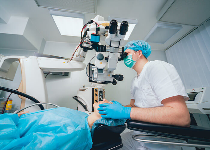 Dr. Barnett performing eye surgery