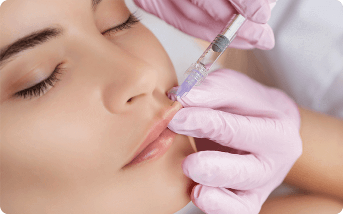 woman getting lip filler injection